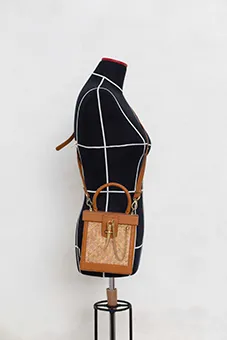 Leather and Straw Bag with Horn Shaped Clasp