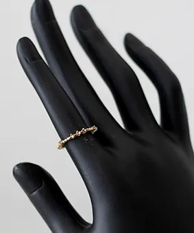 Gold Beaded Band Ring with Small Gems