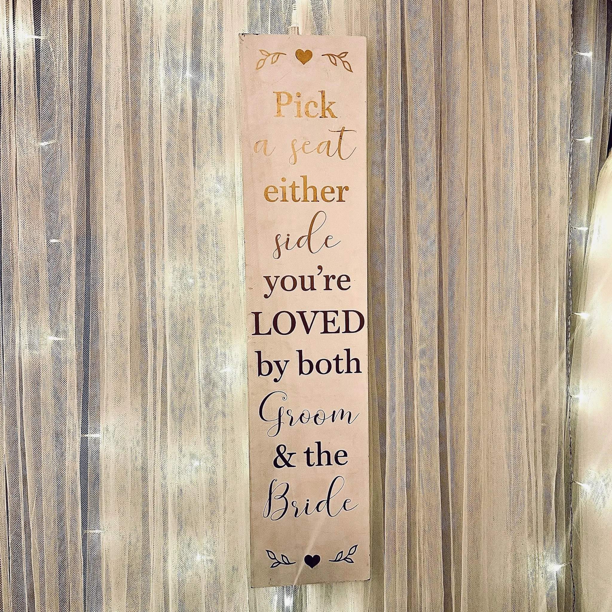 Pick A Seat Either Side, You’re Loved By Both, Groom & The Bride