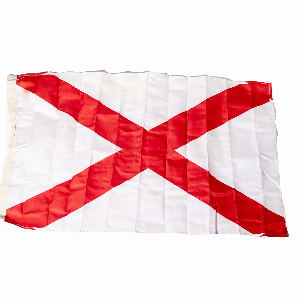 official state flag of Alabama. The flag features a crimson St. Andrew's cross on a white field