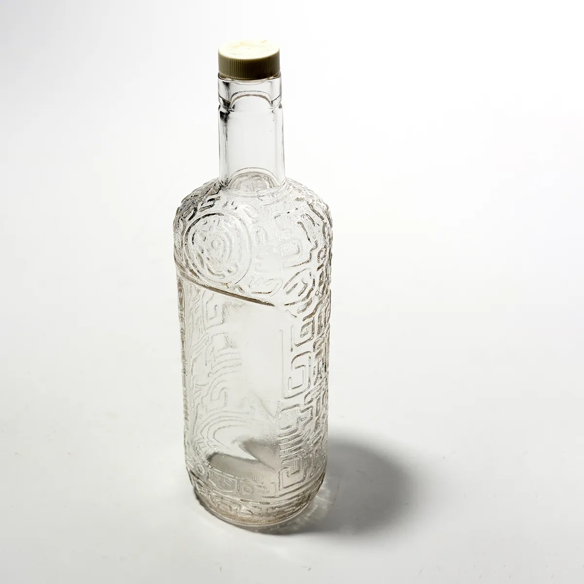 Clear Glass Bottle Liquor Decanter With Tiki Symbols. 