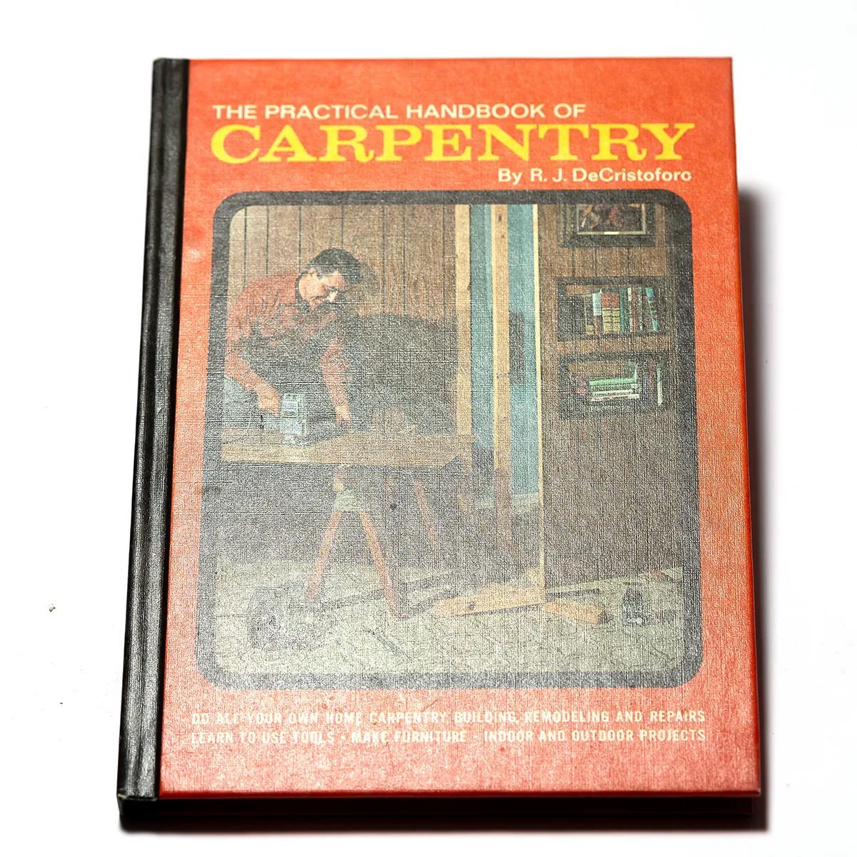 Vintage book "The Practical Handbook of Carpentry" Orange with a photograph of a c9.75" x 6.75" arpenter - 