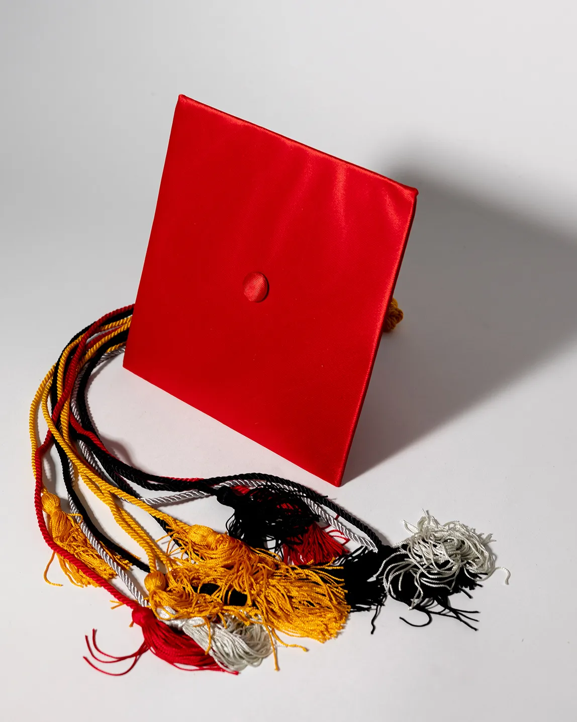 Graduation Garb Hat 9.25" x 9.25" and tassled, Red, Gold, Black and Silver 58"