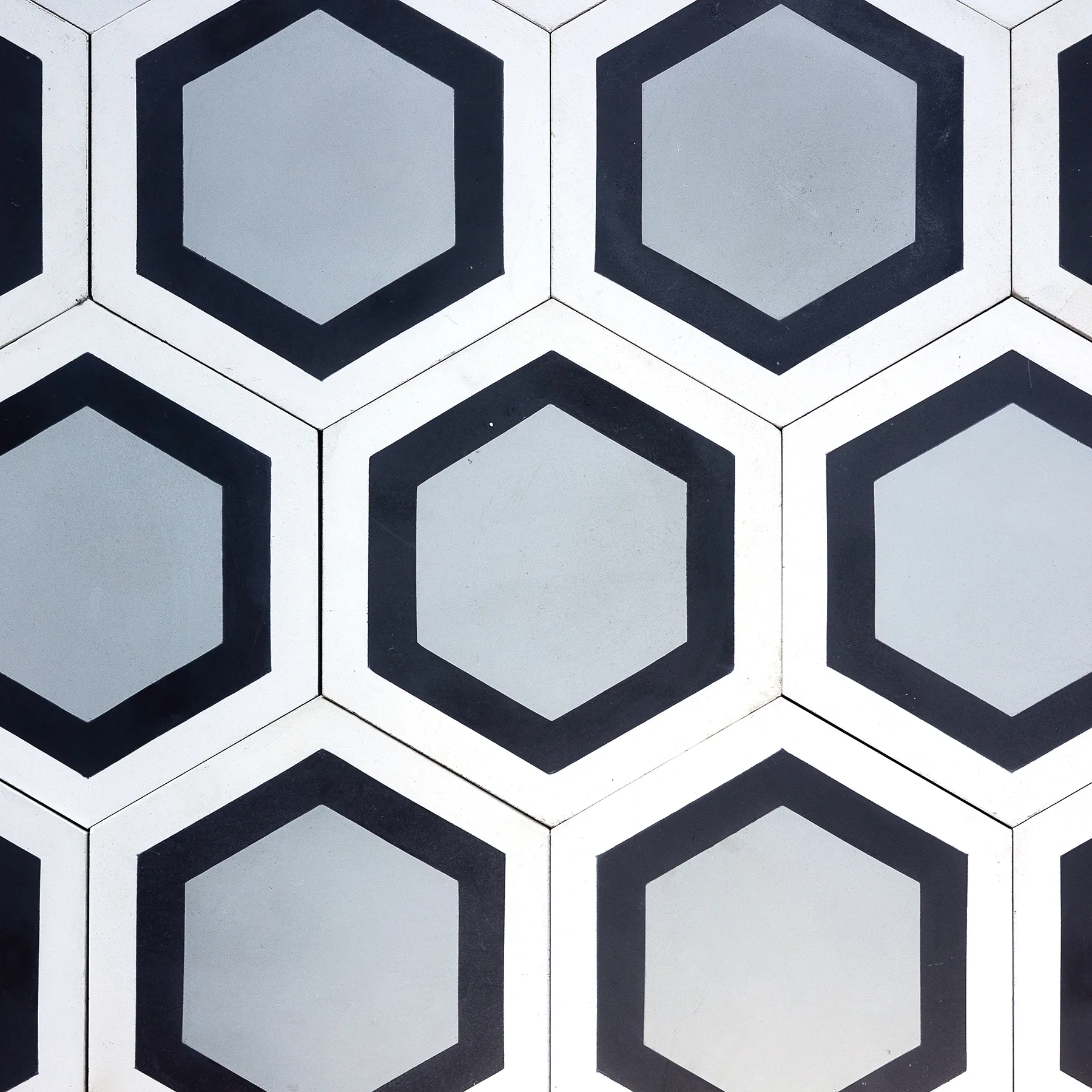 Surface - Unmounted Cement Tiles White, Black and Gray 8" hexagon 15 total - 24" x 24" whole, but it can be configured to your liking. 