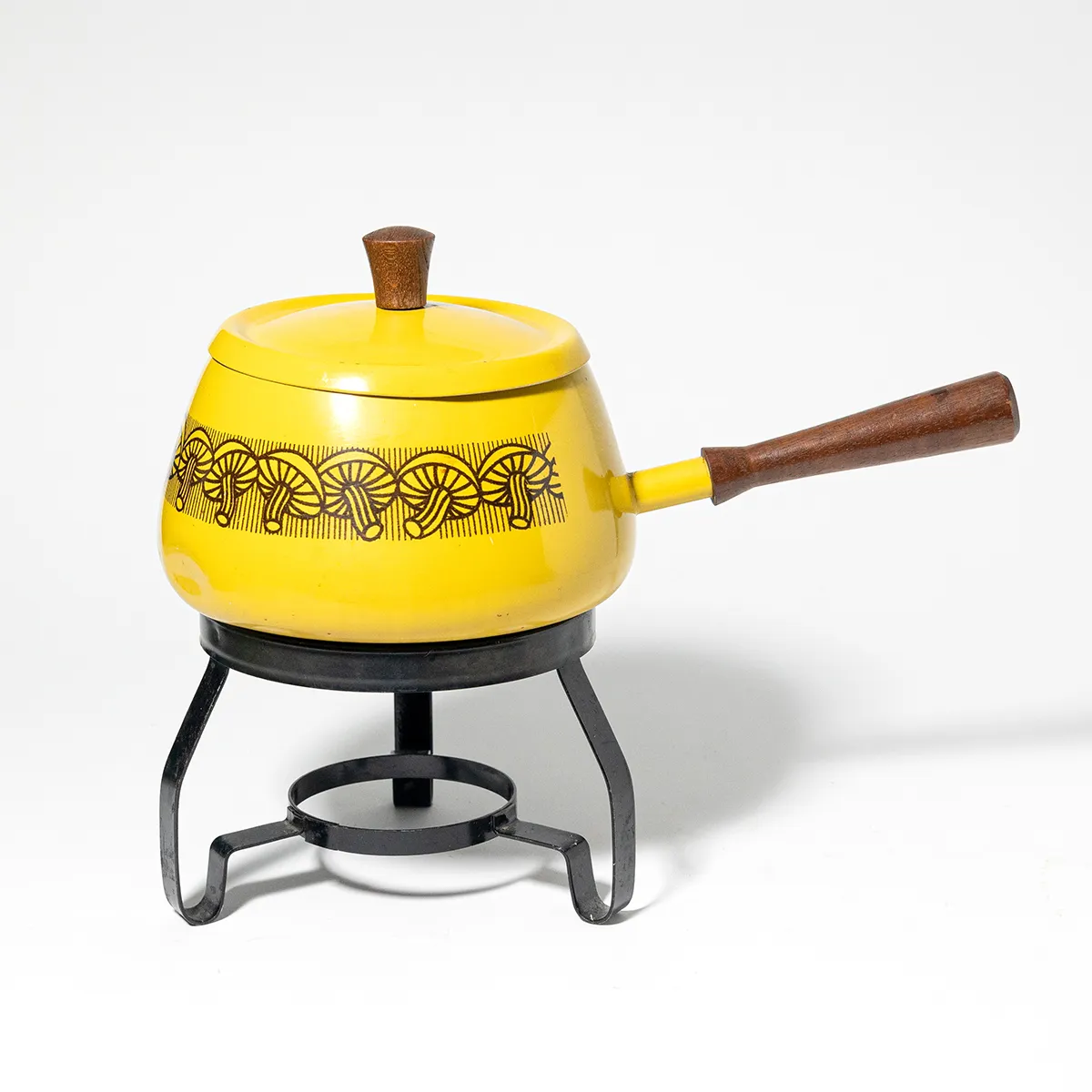 70s yellow Fondue Pot with brown mushrooms around the edge. Wood handle and lid.