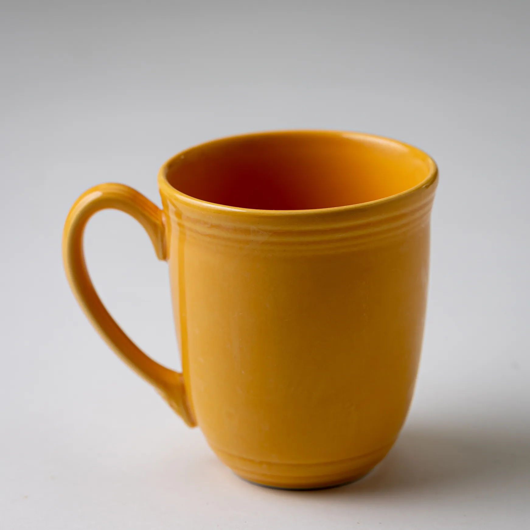 Tall Yellow Coffee Mug with a Flower- 4" x 3.5"