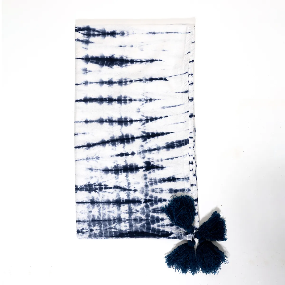 Blue and White Tie Dyed square tablecloth with light yarn pom poms on the corners - 51" x 58"