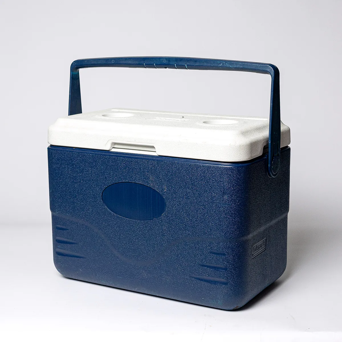Vintage Camping Coleman Cooler Blue with a White Attached Lid.