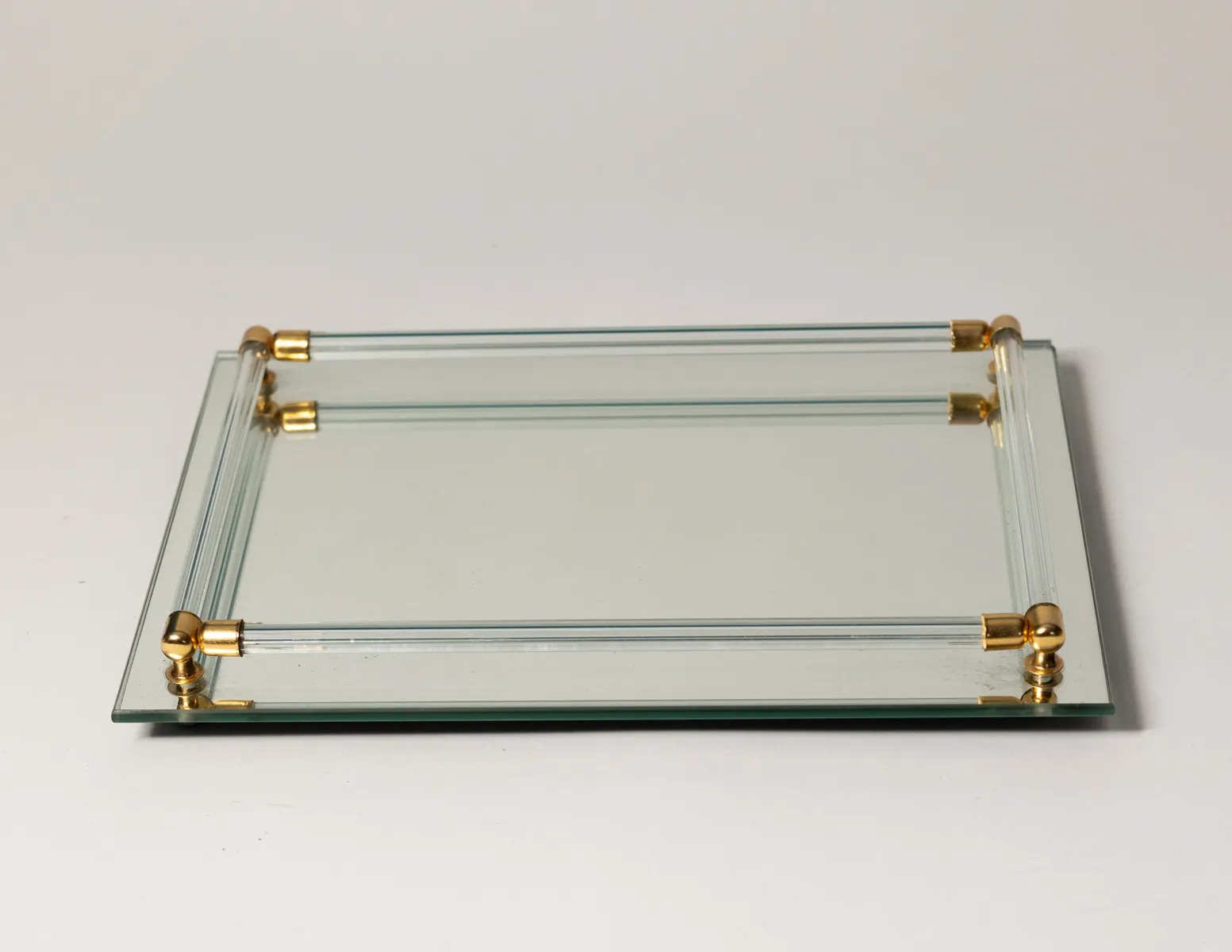 Mirrored Tray with Lucite Rails and Gold Connectors at the corner