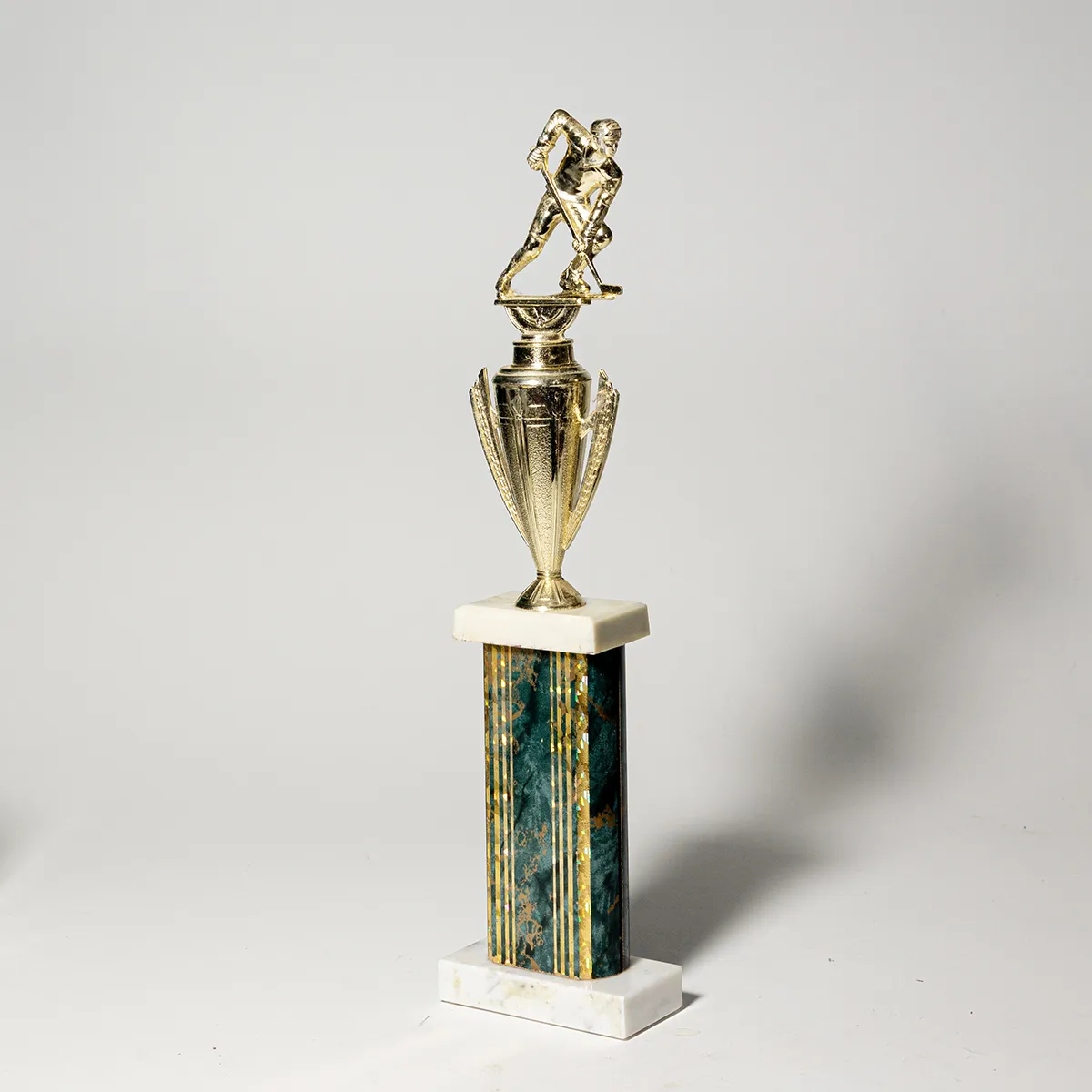 White Marble Green and Gold Wood Gold Plastic Cup and Hockey Figure Trophy