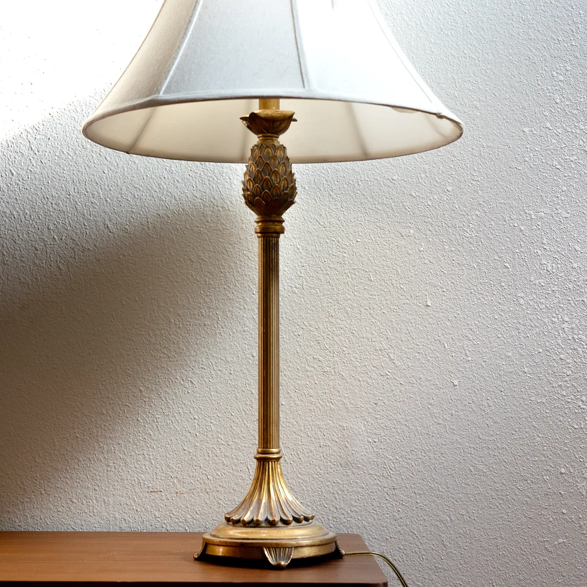 Tall Thin Gold Table Lamp with ornate design that looks like pineapple