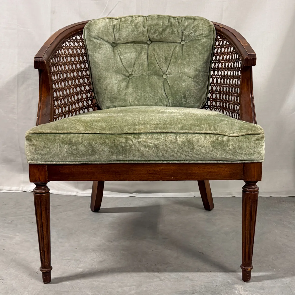 Vintage Pair Mid-Century Caned Barrel Back Armchair with a Carved Wood Frame and Sage Green Velvet Upholstery