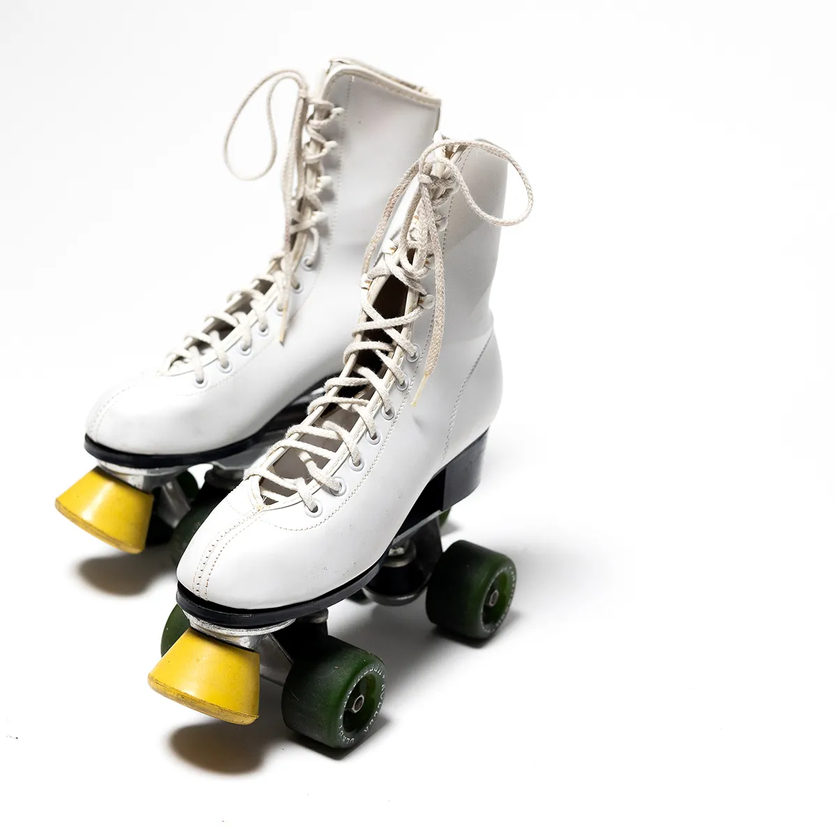 White Roller Skates with yellow Stopper
