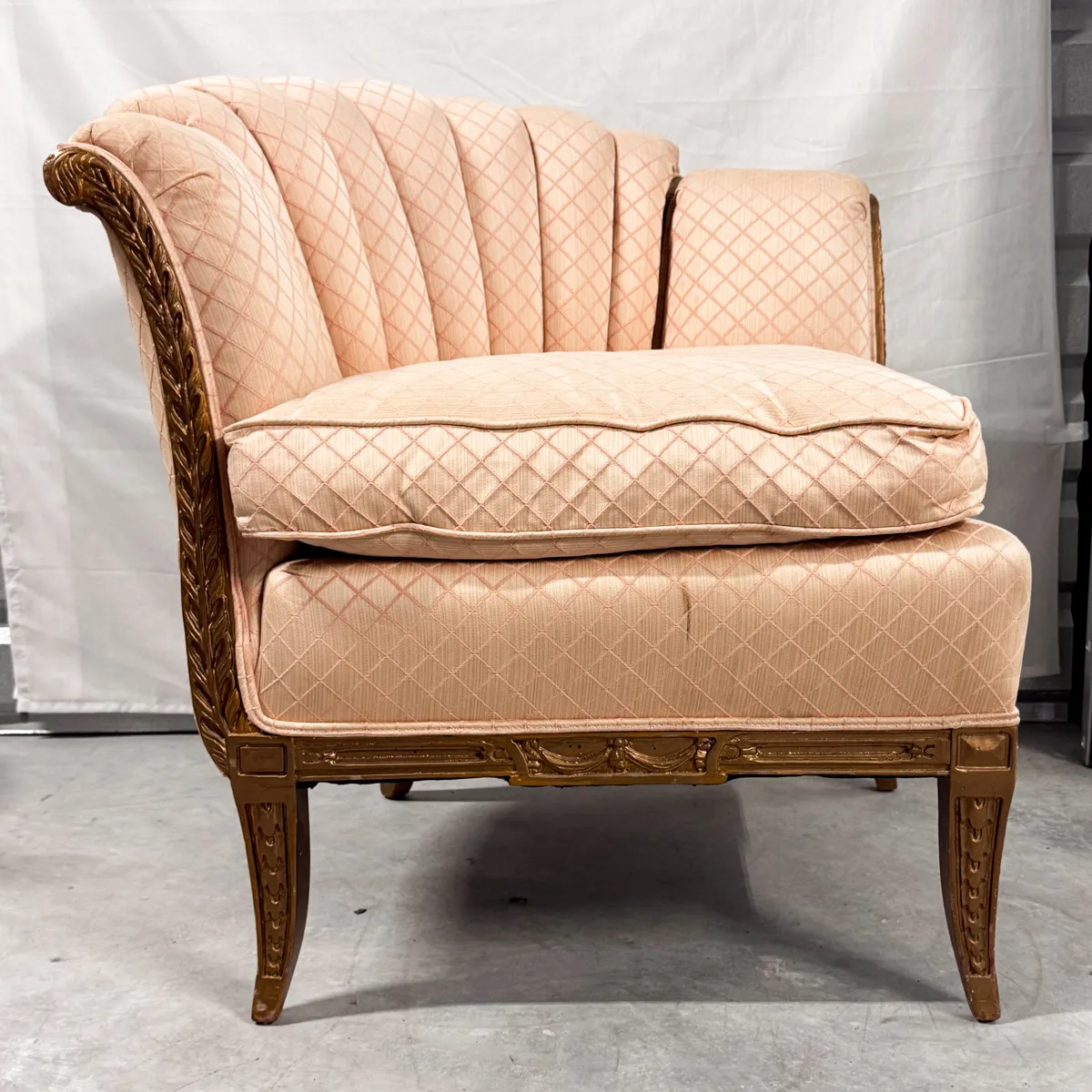 Fan Shaped Fluted Shell shaped Wingback chair Pale Pink Subtle Diamond Pattern with intricate carved wood legs and arm rests
