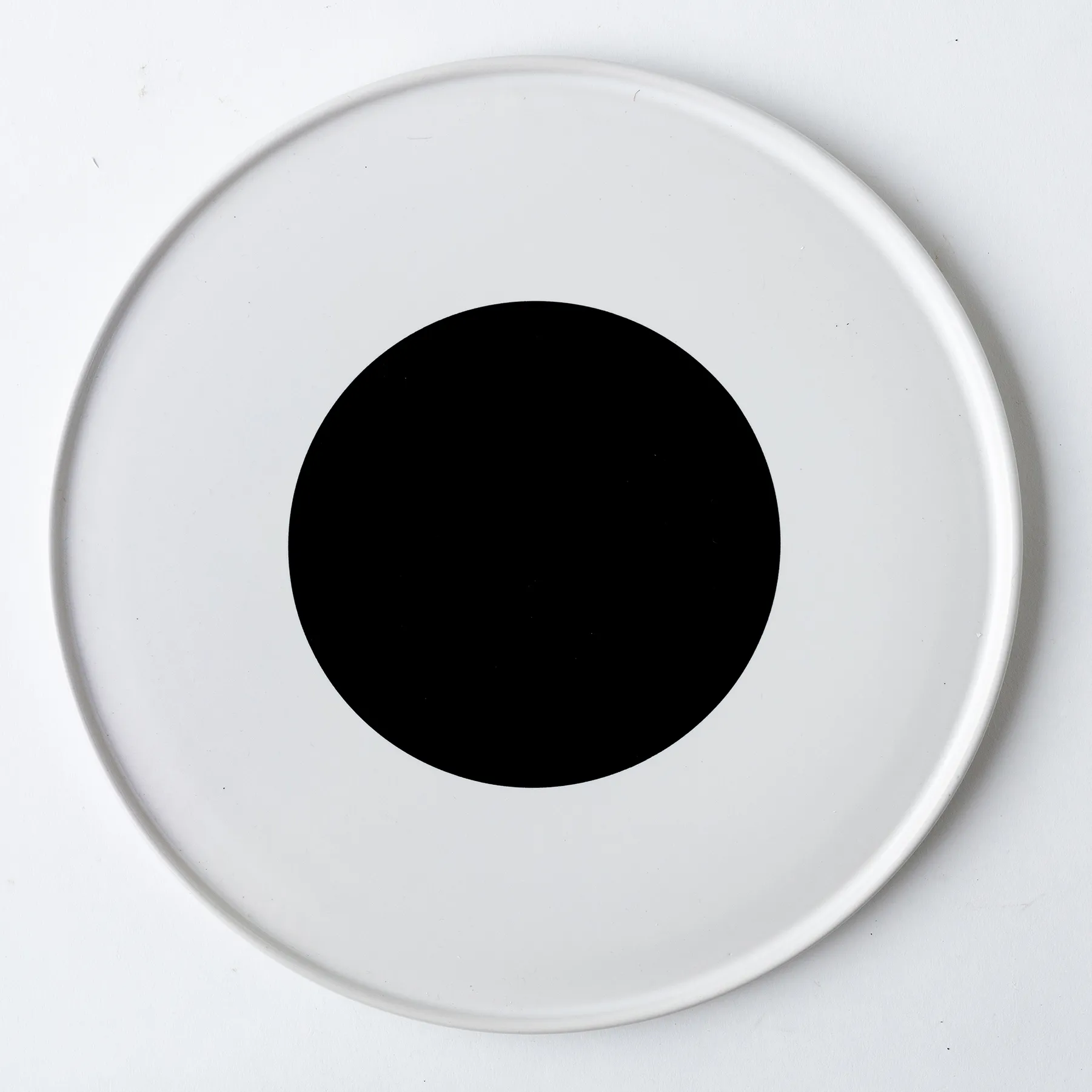 Round Plate with an Edge and a Black Dot 