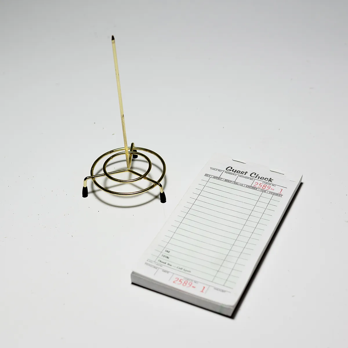 Foodservice Brass Plated Check Spindle Holder for Receipts and receipt order book