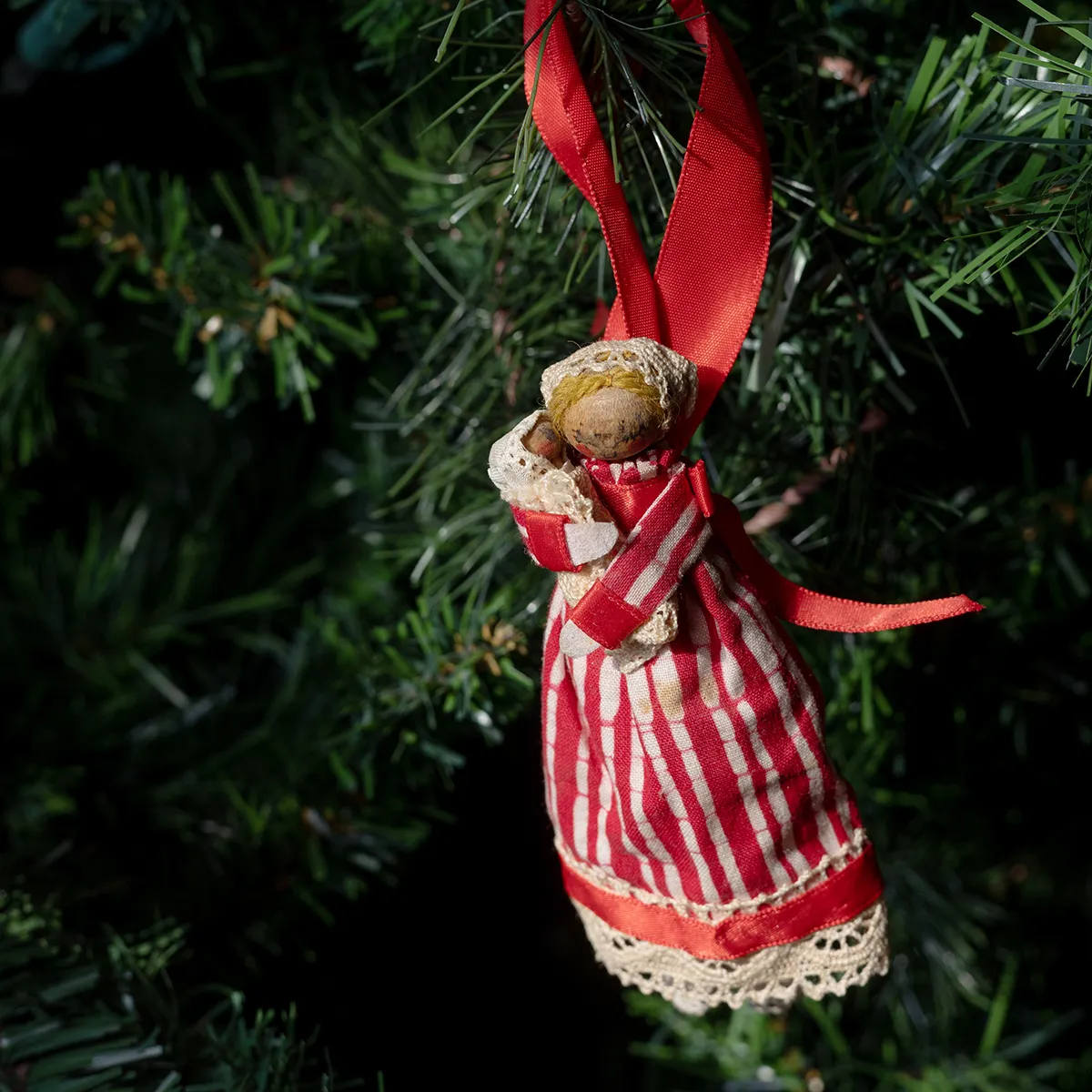 Christmas Tree Ornament: Mother and Child in a red and white striped dress with lacy fringe red ribbon