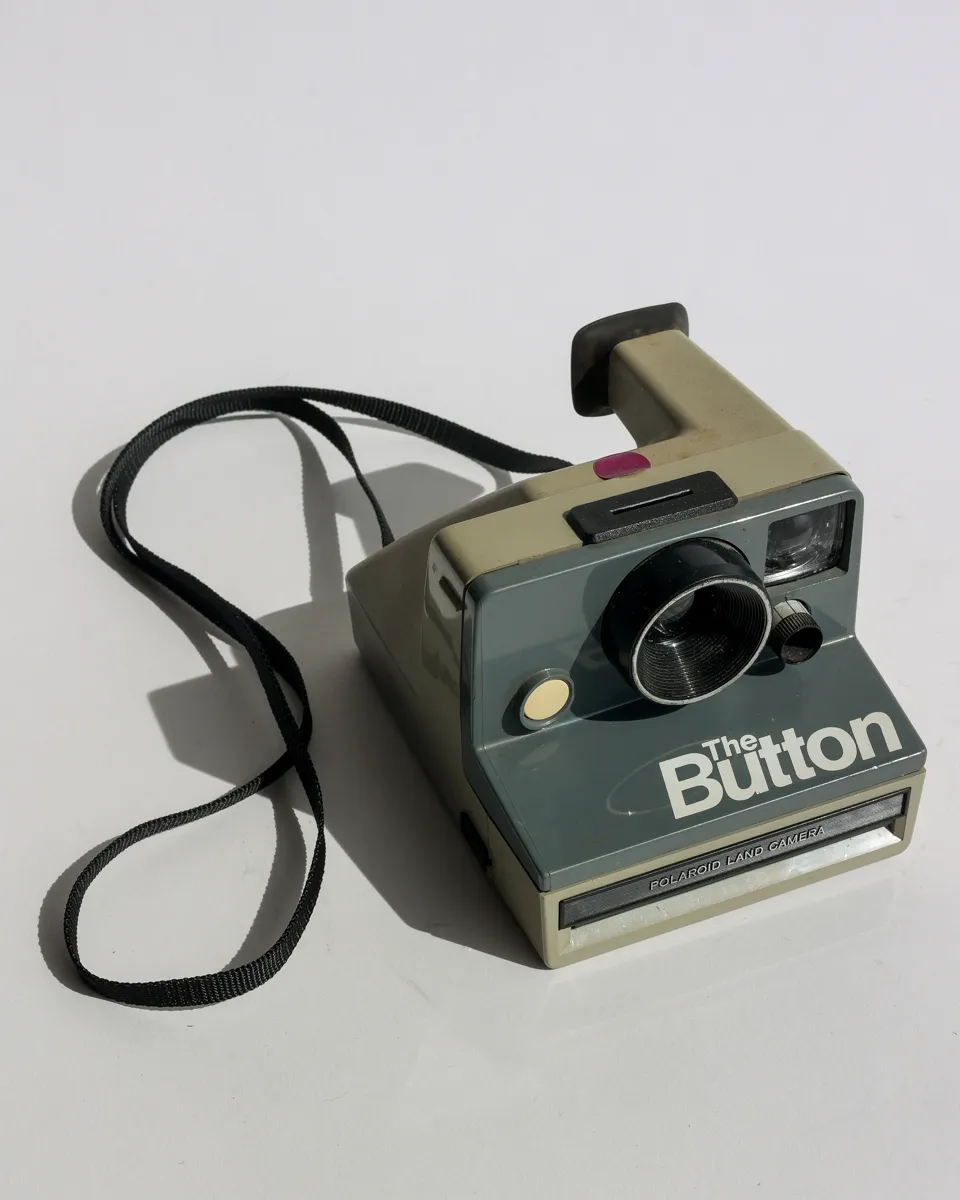Polaroid Land Camera "the Button" Instant Film, Pastic Gray Hand Held Camera