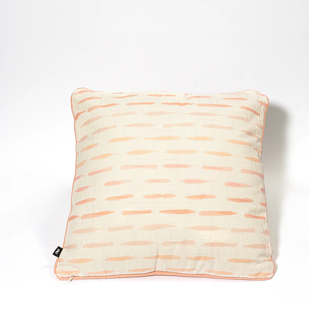 Cream colored throw pillow with Pink, peach and pail pink modern drip design - 16"