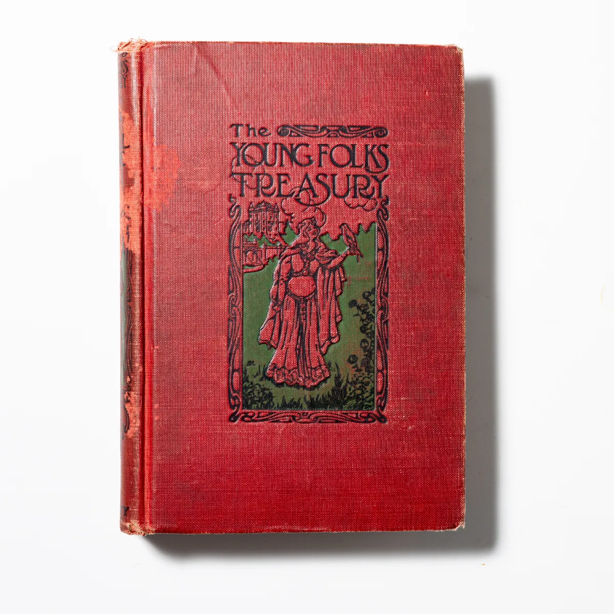 Book: The Young Folks Treasury Red with embossed cover of a woman
