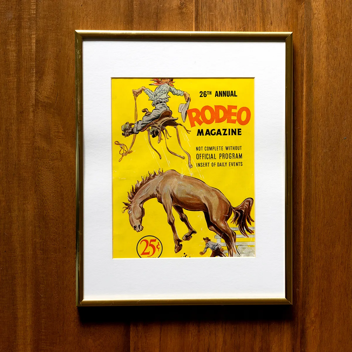 1951 Cover of Rodeo Magazine yellow cowboy, gold metal frame