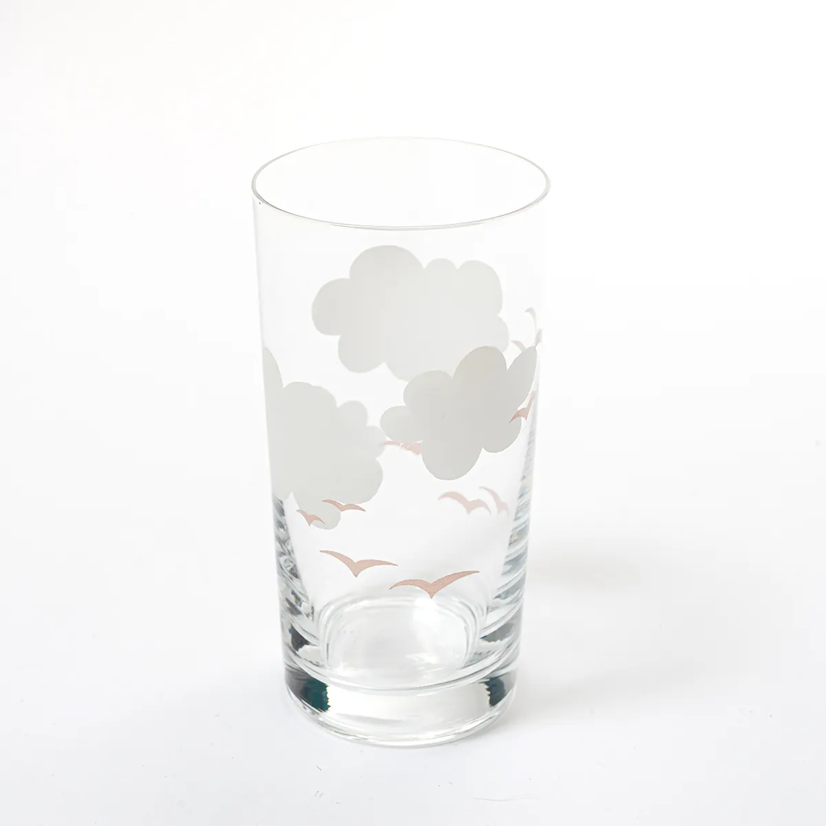 Clear Water juice glass with fluffy white clouds and pink flying birds on the outside - 5.25" x 2.75"