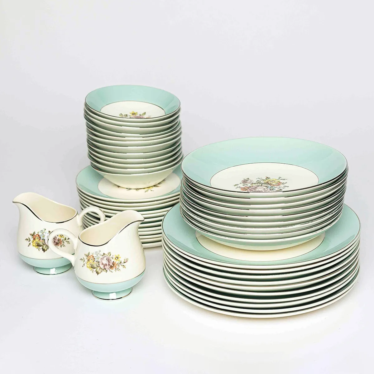 Dining Fine China: Full Set - Sketched Pink, Yellow and Green Flower Pattern in the middle on off White with a wide Tiffany Blue Robins Eggs Blue Band around the outside