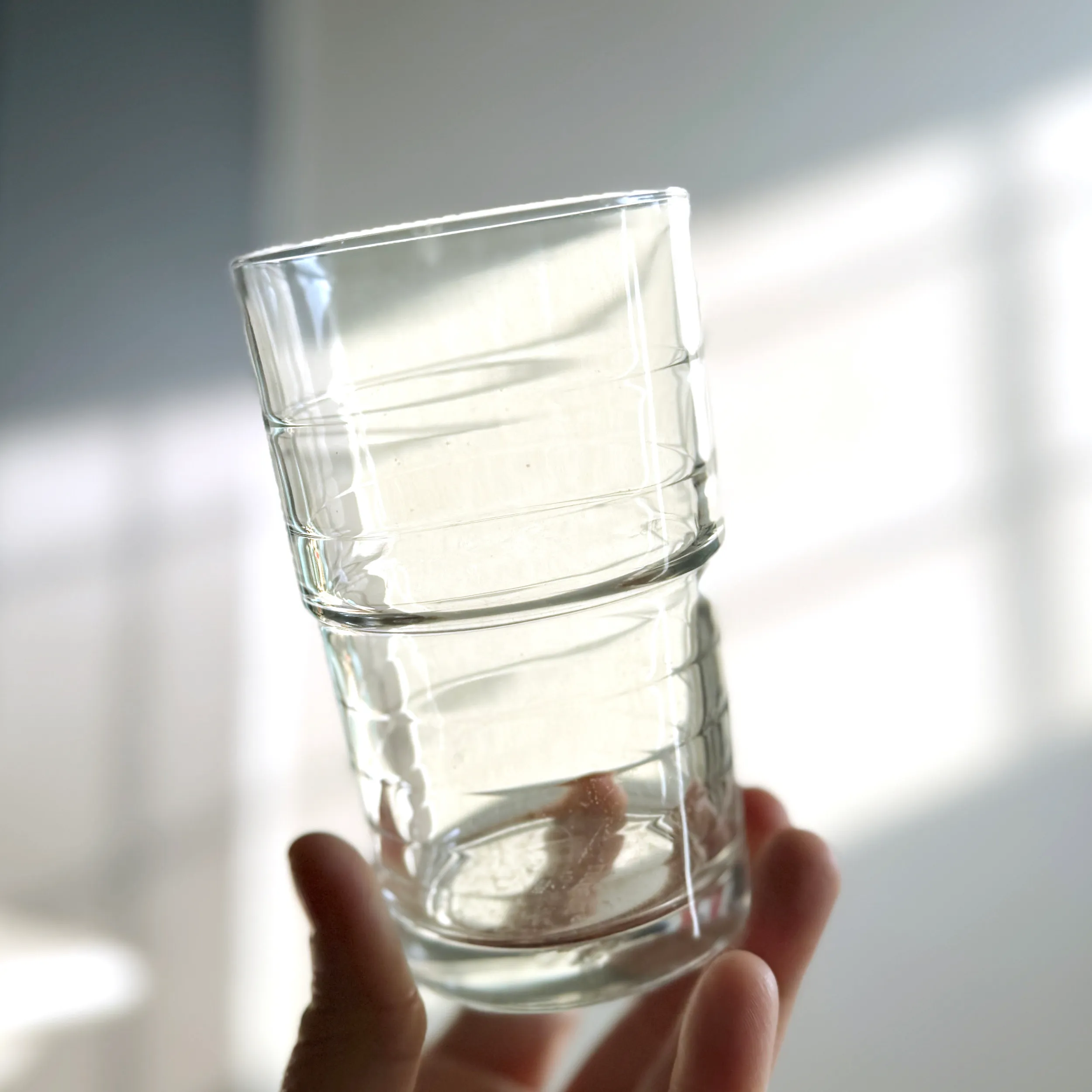 Clear Glass Tumbler Modern style with a distinctive ribbed pattern around the body