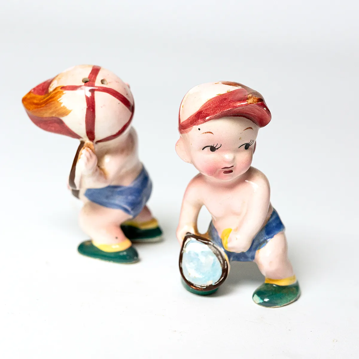 Kitchen Salt and Pepper: Statue of Boys Playing Tennis Salt and Pepper Shaker made in Japan 50 or 60 -  4" x 2"