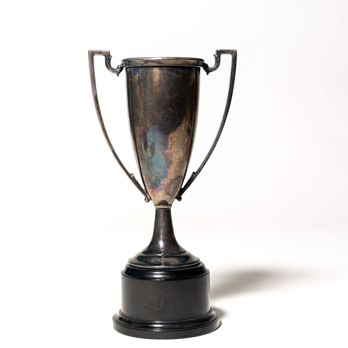 Silver Plated Trophy Cup. Etched with name, and dates. Black Plastic Base