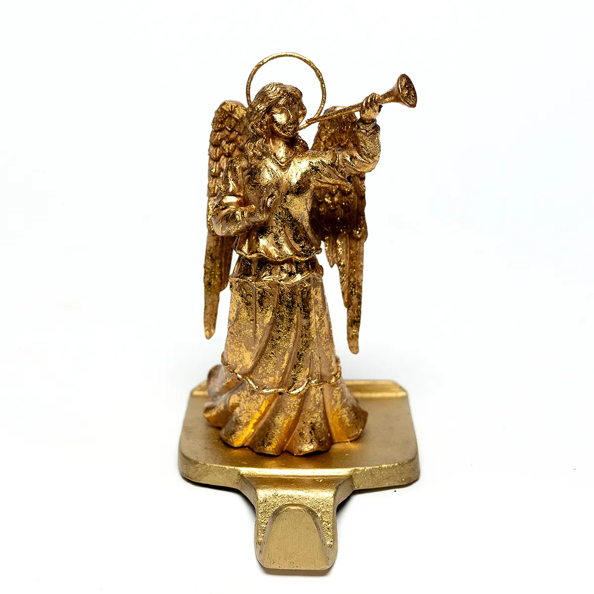 Gold Angel Statue with a halo and wings blowing a long horn. Mantel Piece Statuette with a hook designed to hold a Christmas Stocking  