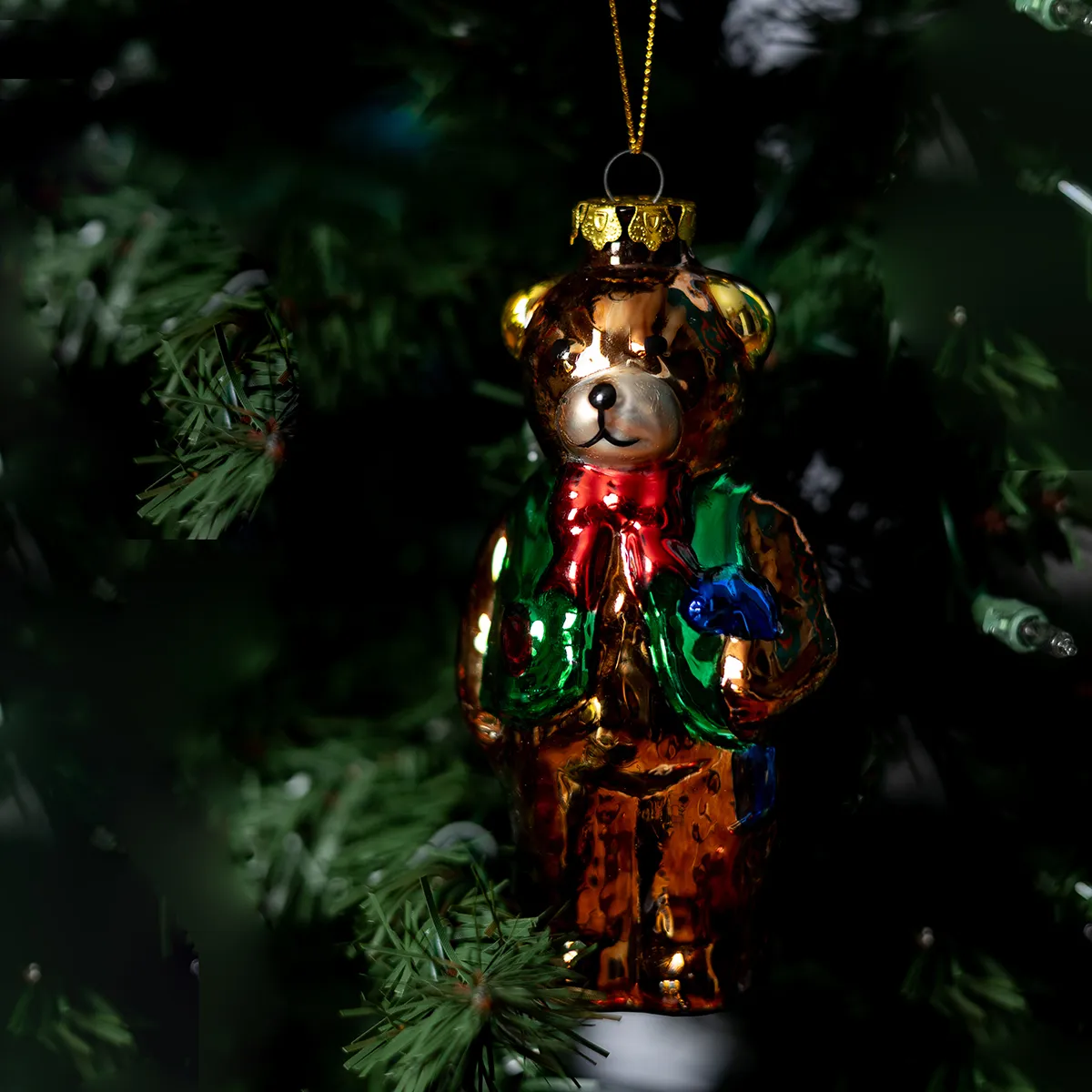 Glass Christmas Tree Ornament Teddy Bear in a green vest and red bow tie