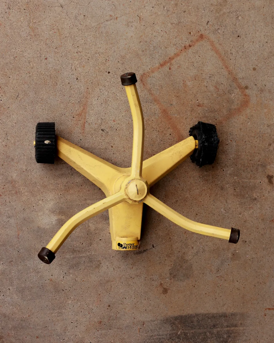 Vintage Yellow Wheeled Three-Arm Rotary Lawn Sprinkler