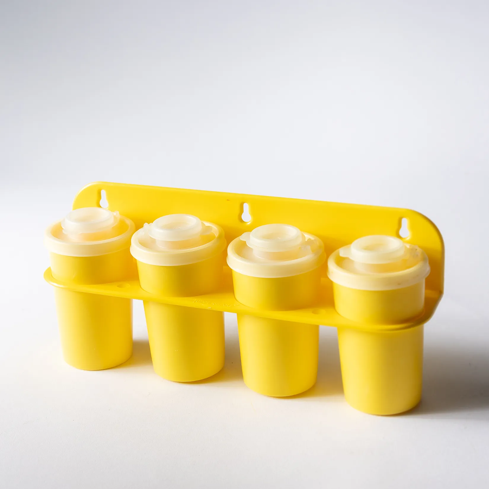 Yellow Plastic Tupperware Spice Rack - 10" x 2.5" 
