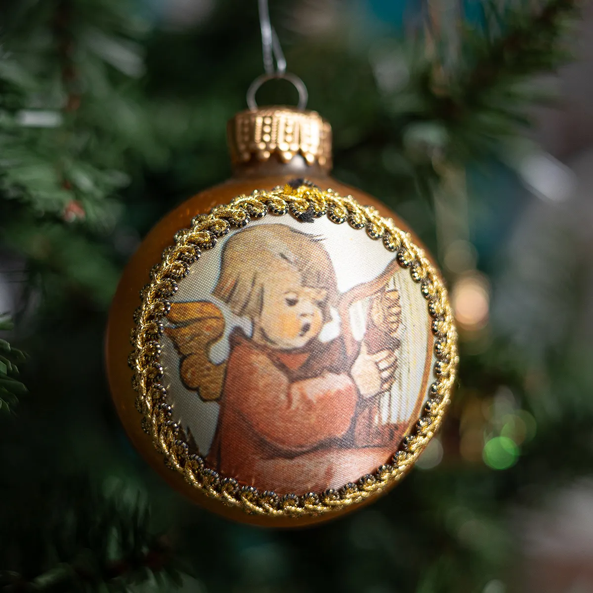  Vintage brown christmas bulb ornament wit small child playing a harp "christmas 1980"