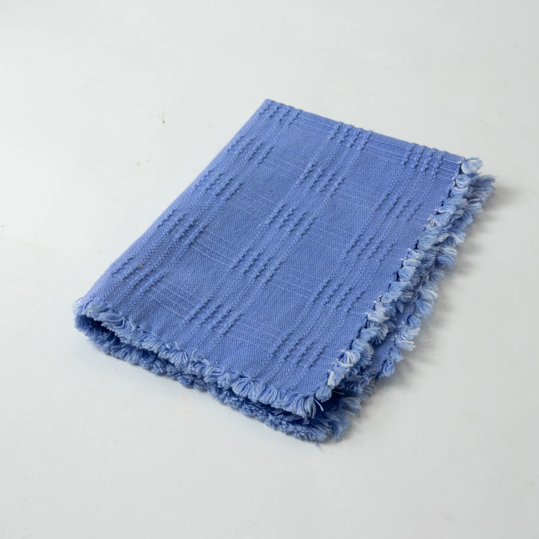 Blue woven placemat 16" x 11"