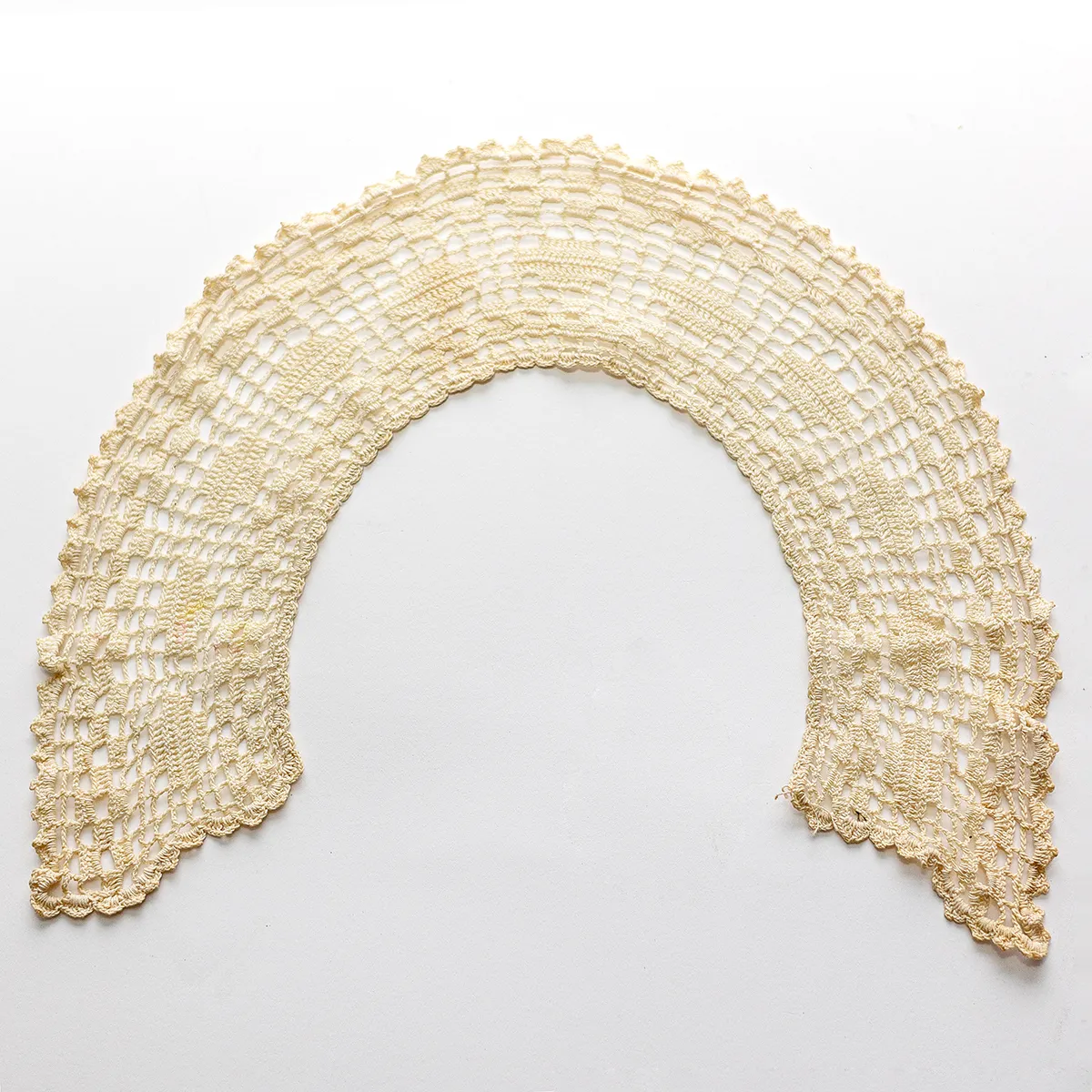 Vintage Handmade Lace Cream Ecru colored shaped like a collar wraps around a dish