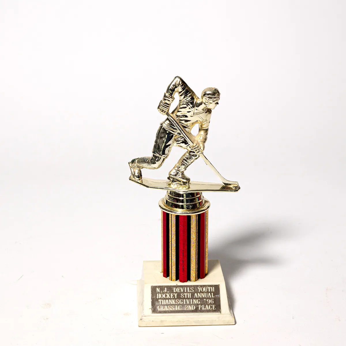 Vintage Plastic red, black and Gold hockey trophy