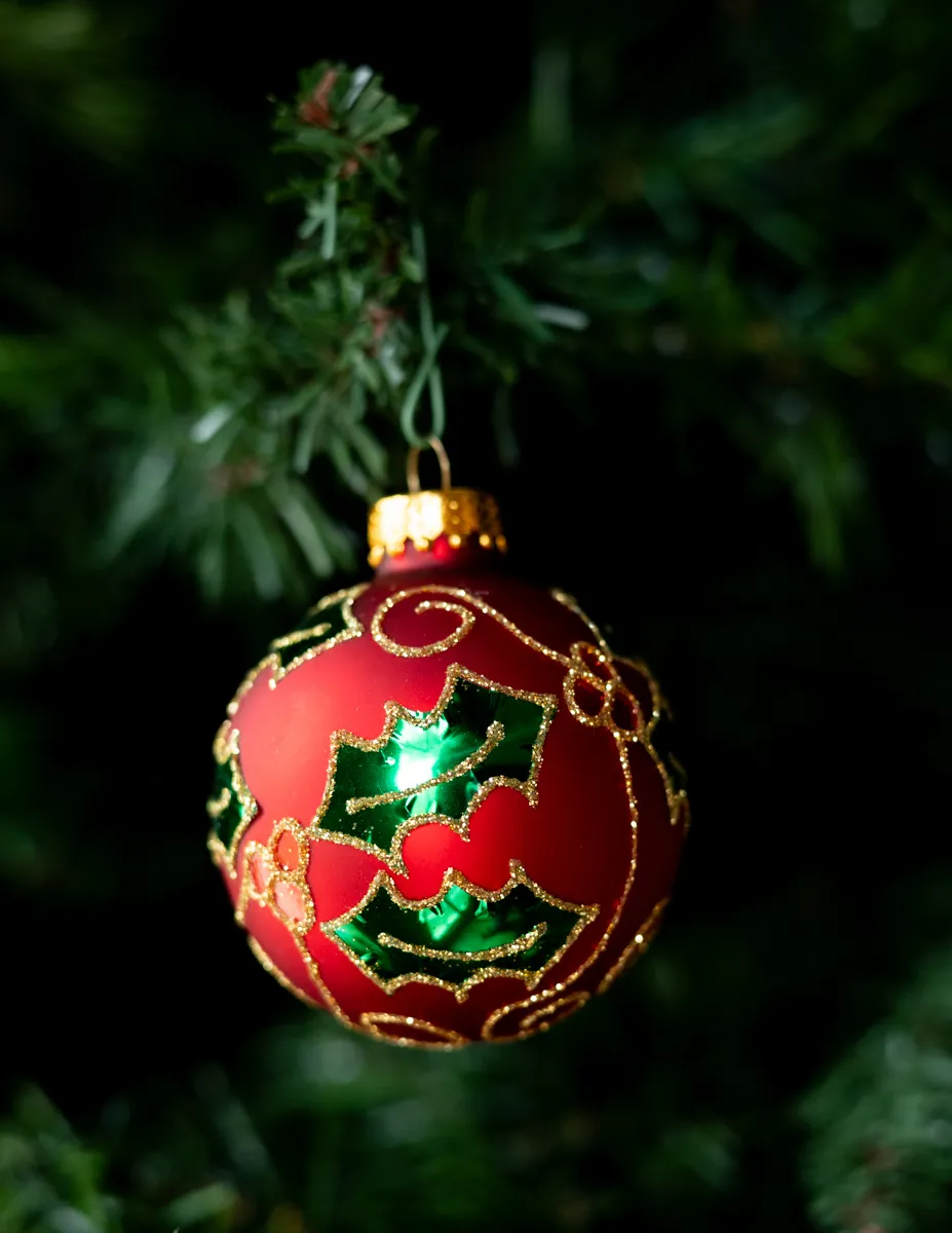 Christmas Tree Ornament Frosted Red Round Bulb with Glitter Decoration and Green and Red Holly painted on