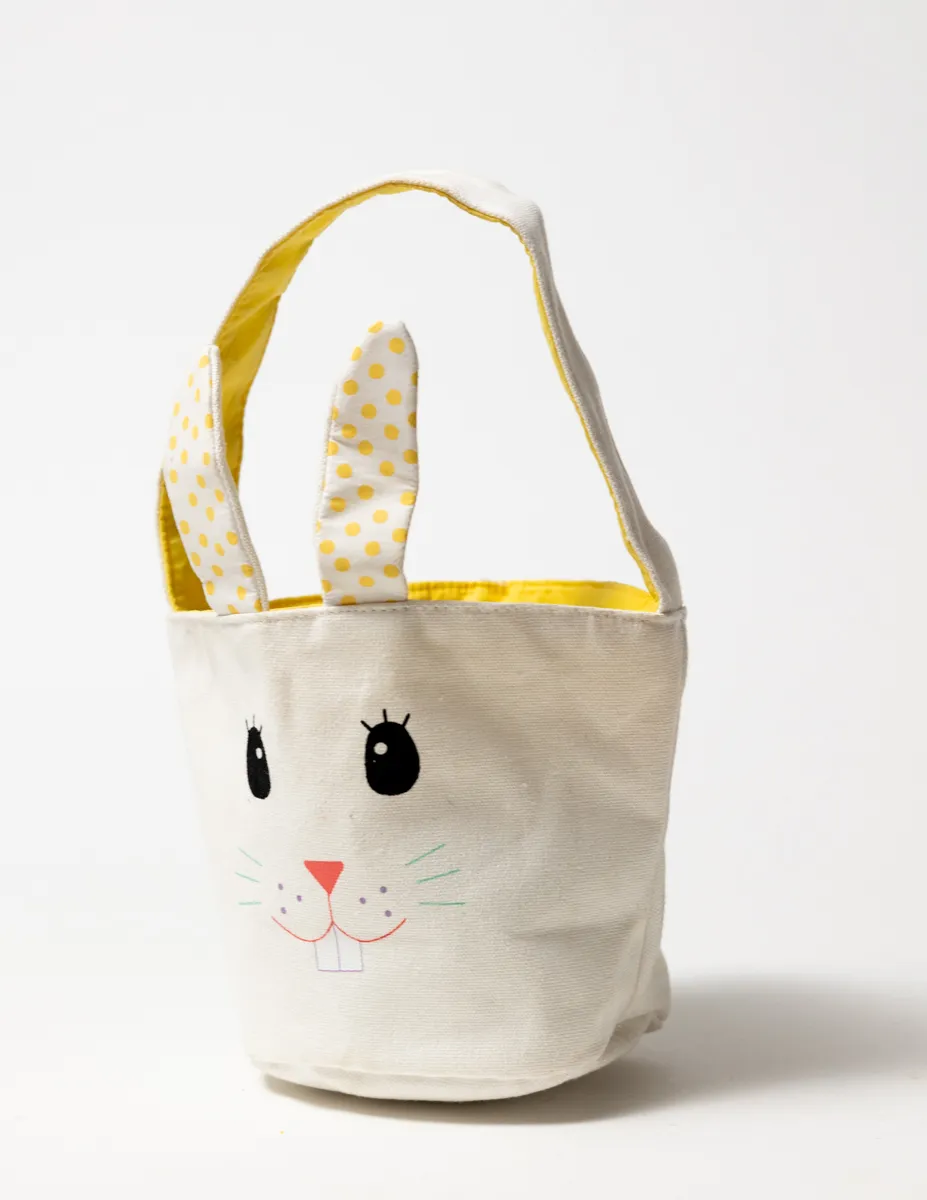 White Fabric Easter Basket with a Rabbit Face and with Yellow Polka Dot ears
