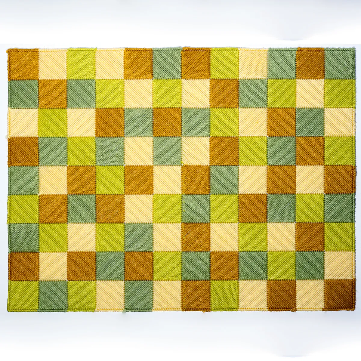 Hand Made Stitched Yarn Multiple shade of Green and yellow, stitched into cubes to make a photography surface