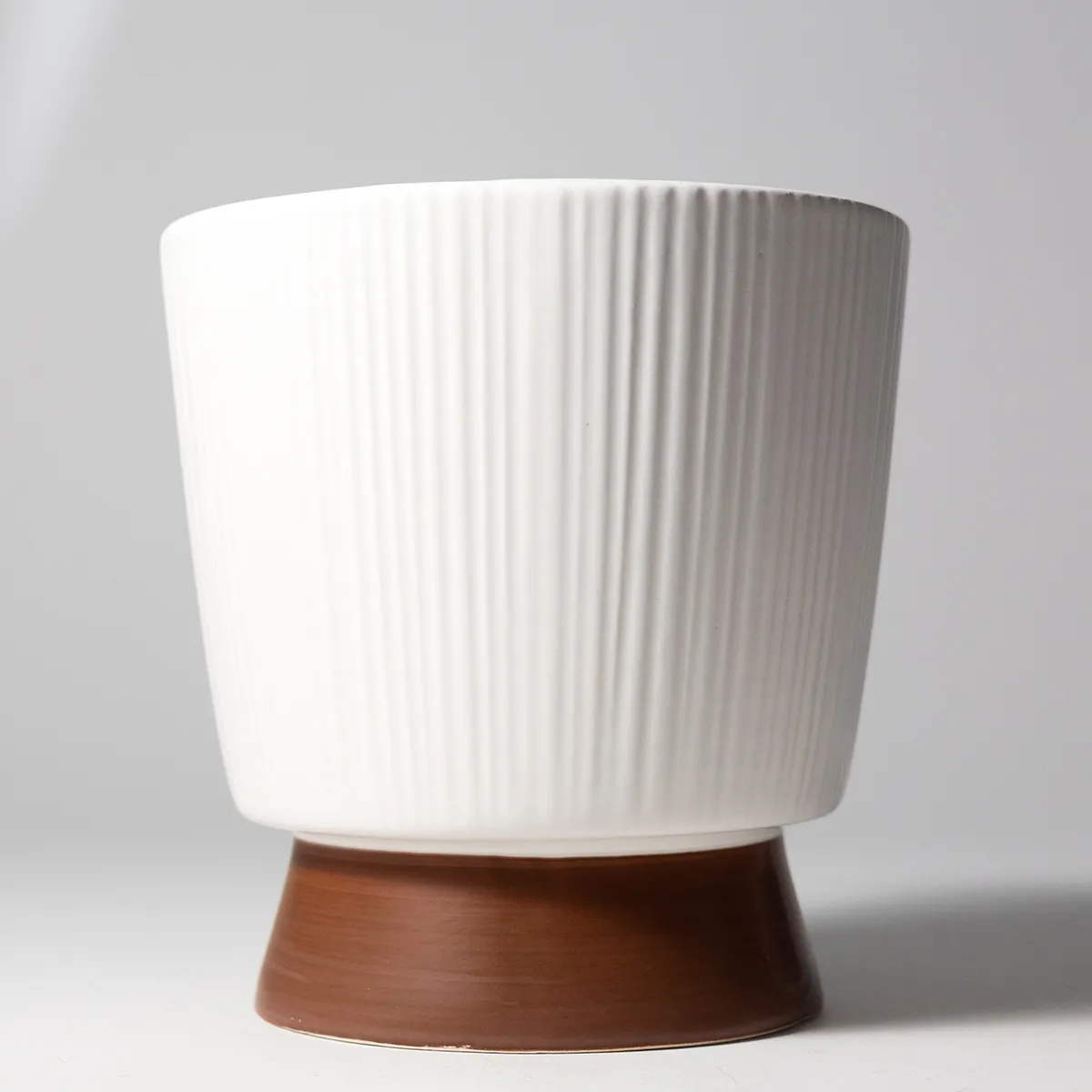 White Ribbed Ceramic Planter, Pot, With a brown faux wood base