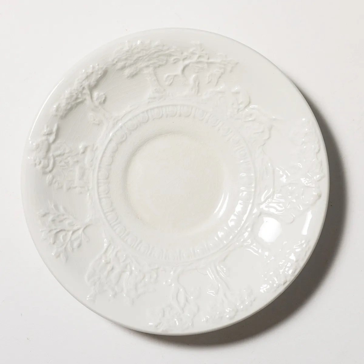 White Ceramic Dessert Plate with Embossed Greecean Theme around the edge
