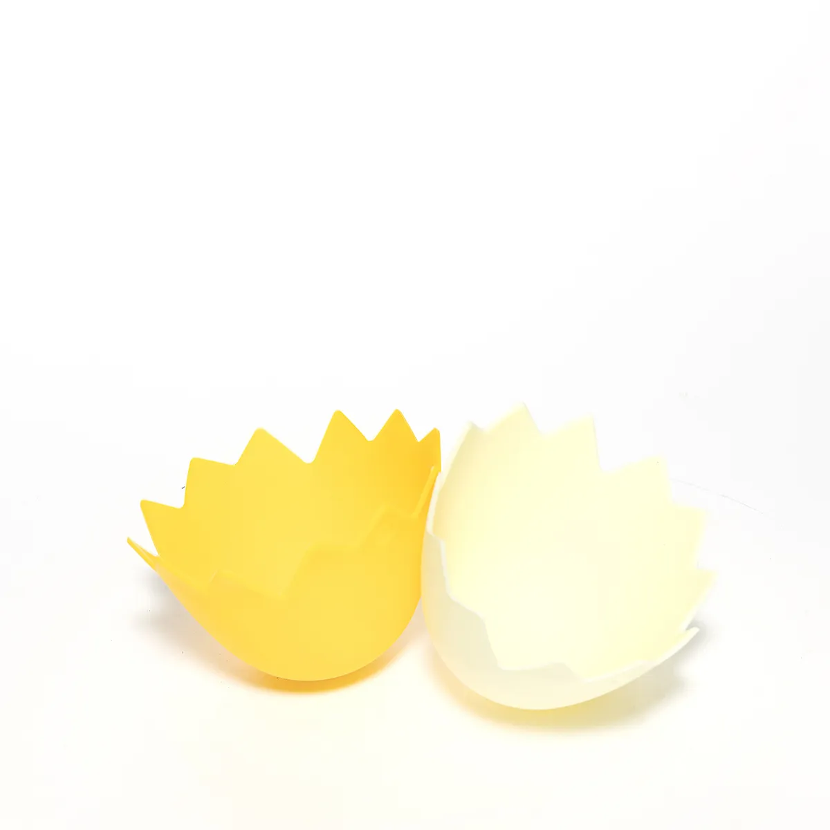 Silicone Egg Poachers looks like cracked eggs yellow and white - 3" x 3.5"