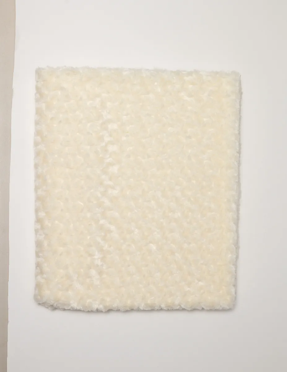 Fabric: Cream Colored Lamb like Fur Fabric
