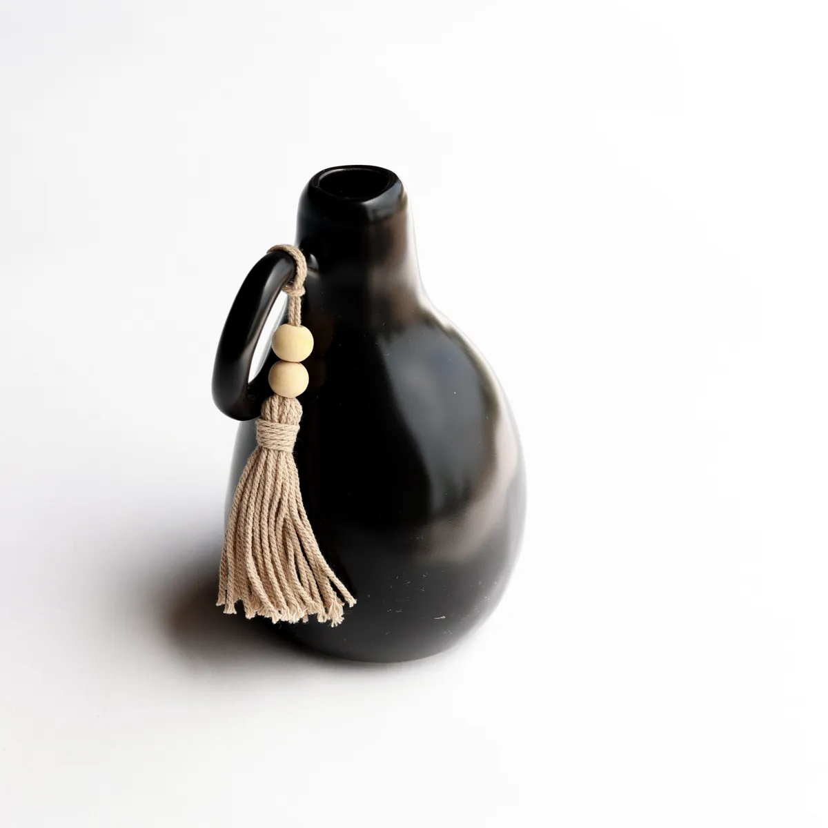 black ceramic jug vase boho tassel beaded