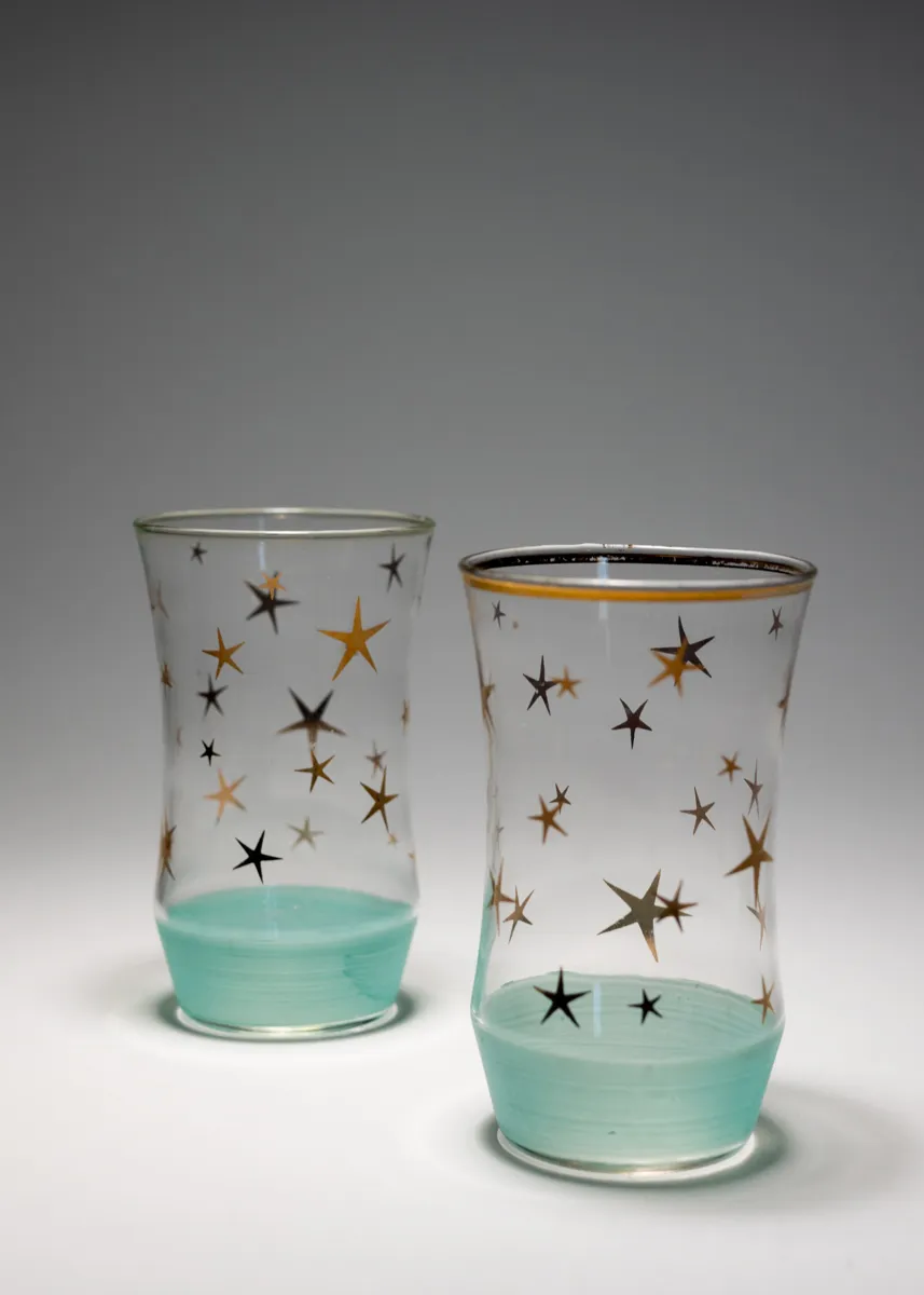 Clear Glass Tumbler with blue painted bottom and gold starts sprinkled throughout