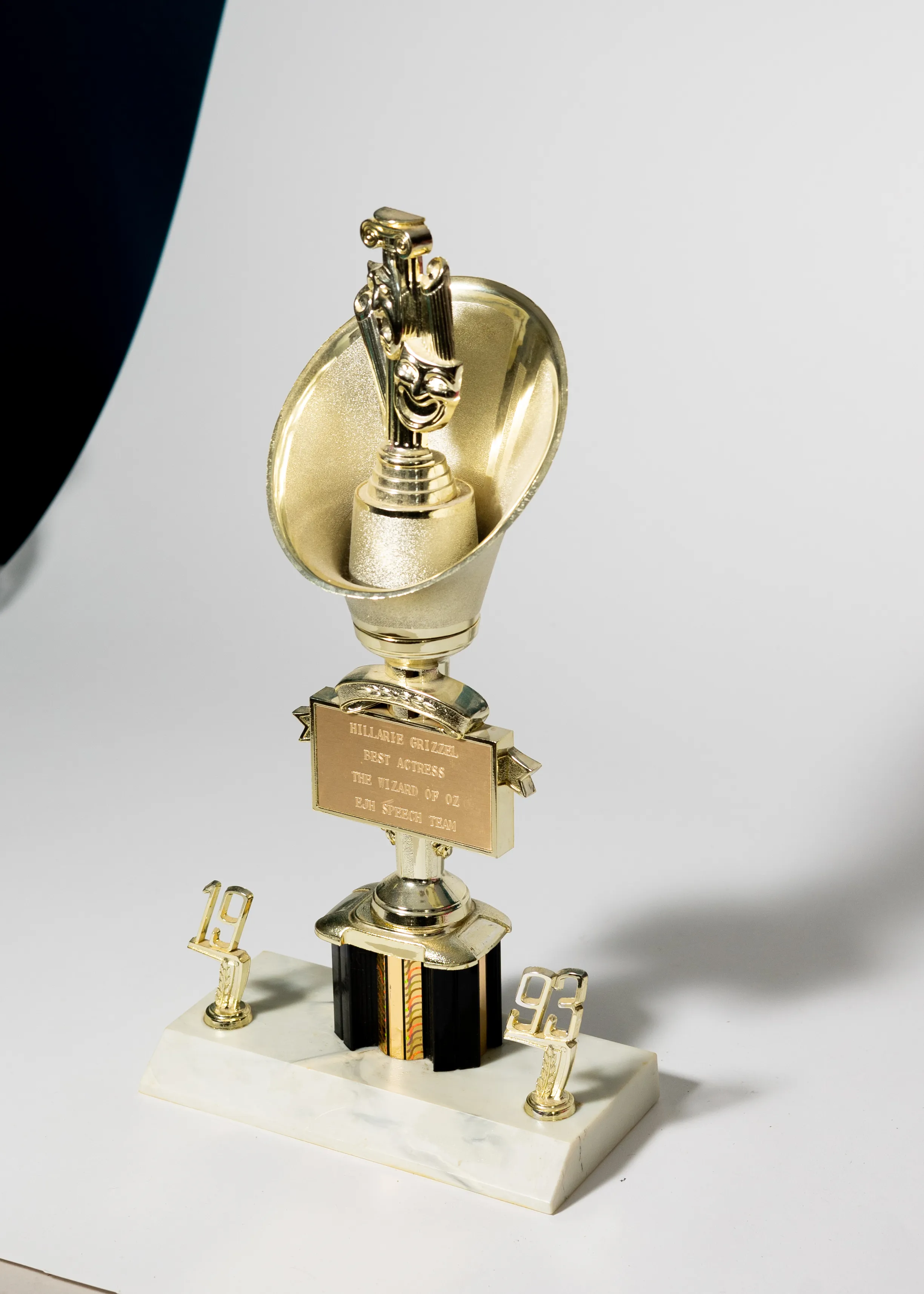 Theater Trophy Gold and Black, faces in a cup