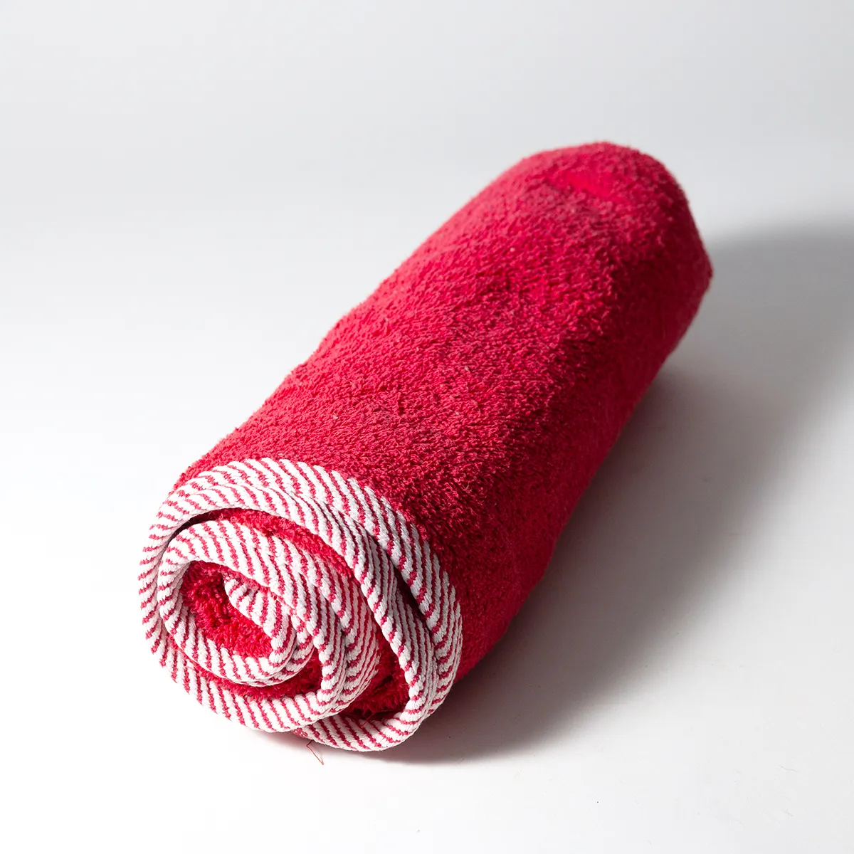 Used Red Towel with Candy Cane Striped Edging