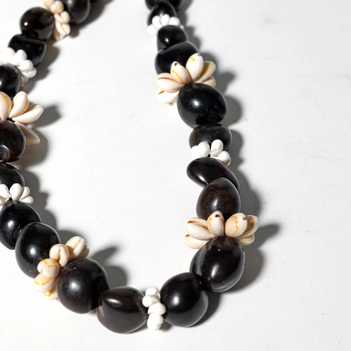 necklace made of Black and White larger seashells Hawaiian